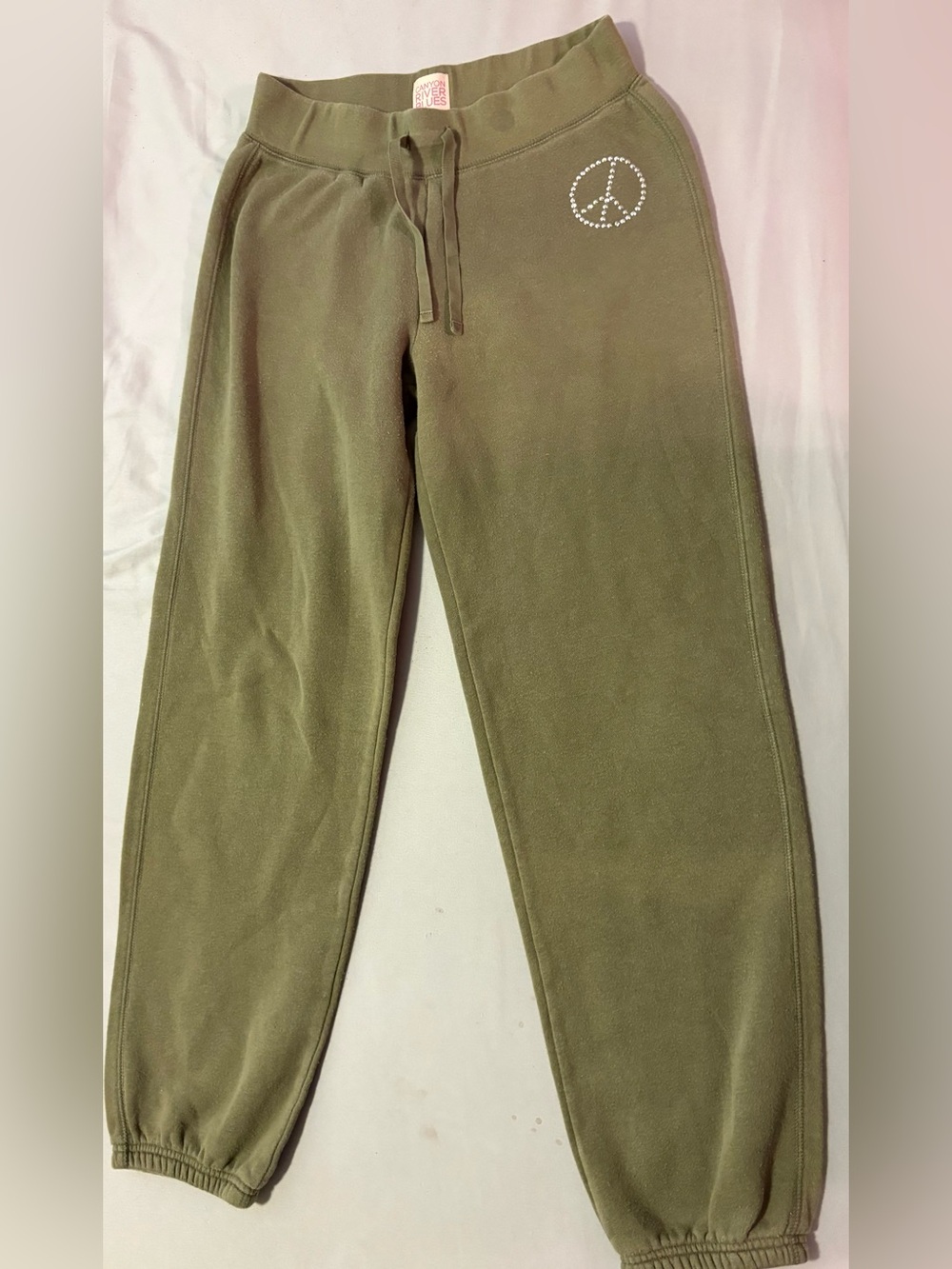 Canyon River Blues Olive Green Woman’s Fleece Joggers with Rhinestone Peace Sign